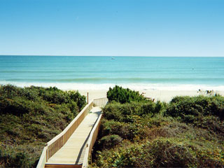 overlooking wooden walkway to beach access with Atlantic Ocean in the background